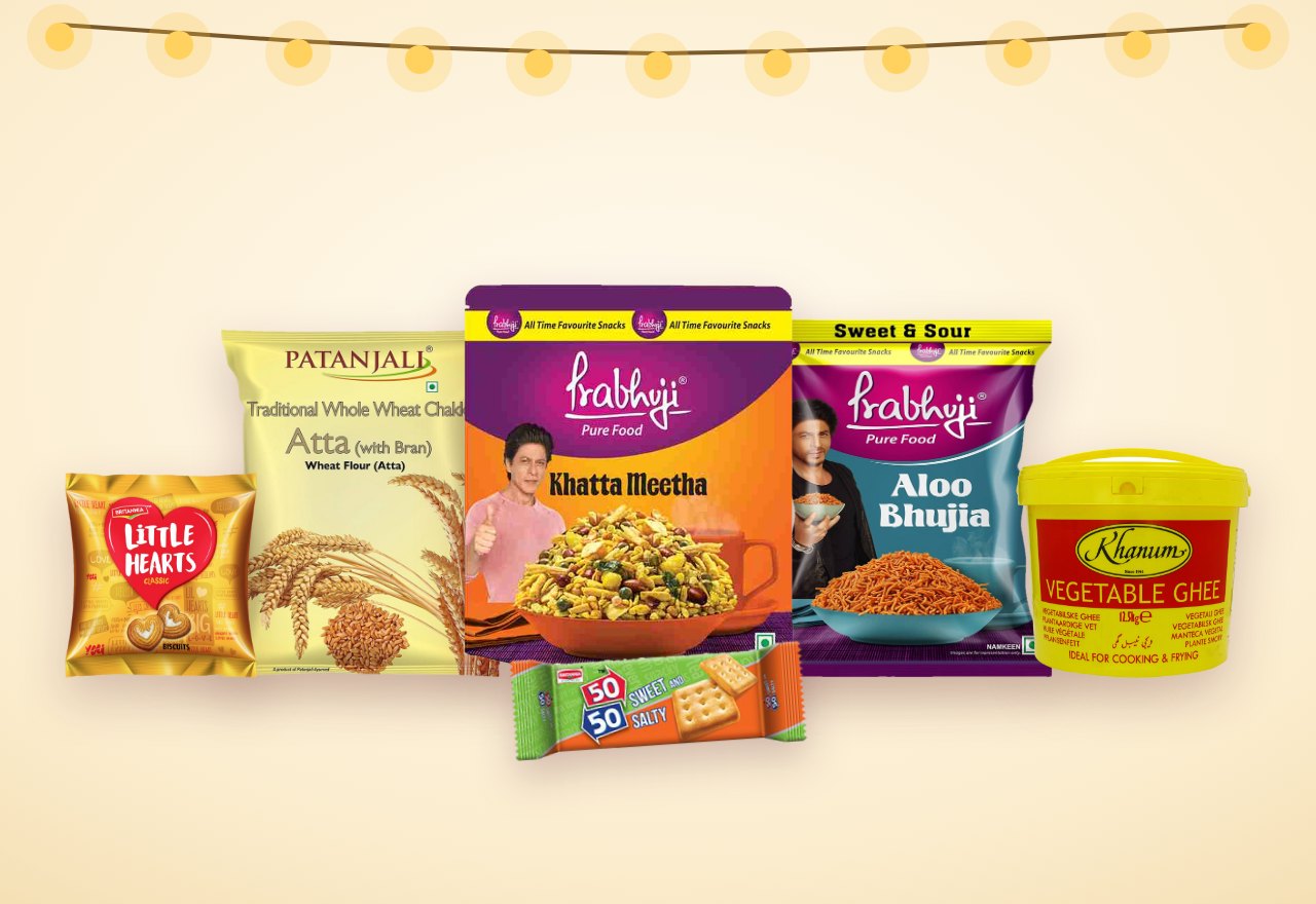 Beispiele aus der Gratis-Karton-Auswahl: Britannia Little Hearts und 50-50, Patanjali Atta, Prabhuji Khatta Meetha und Aloo Bhujia, Khanum Vegetable Ghee